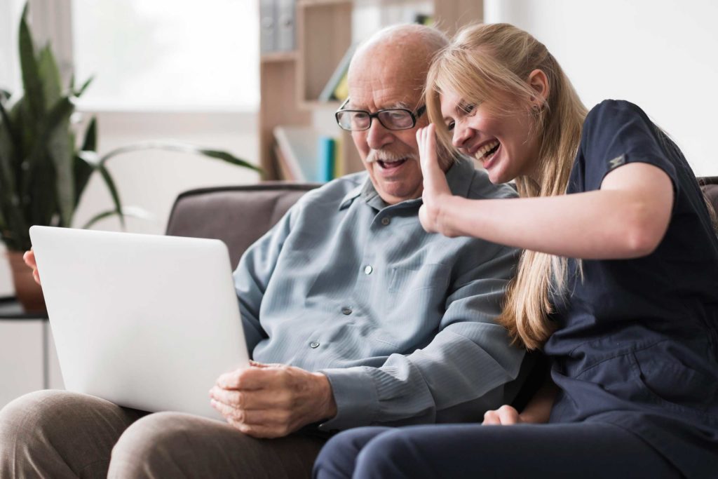 Family on a video with home care provider for a consultation