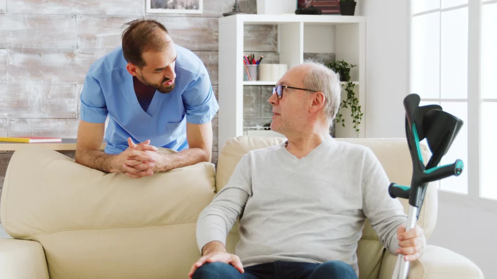 communication in homecare and elderly man and caregiver