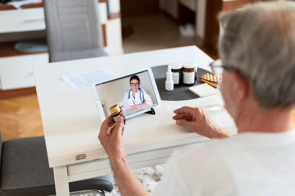 Elderly man, technology and ipad at home with medicine.